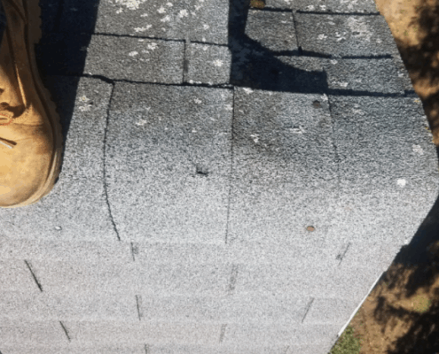 Nails popping up on caps and holes in caps means the shingle is compromised and can be a cause for roof leaks