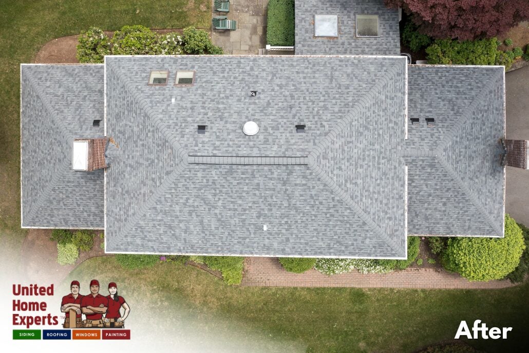 Aerial view of completed asphalt roof replacement in Concord MA with Owens Corning TruDefinition Duration shingles in Estate Gray